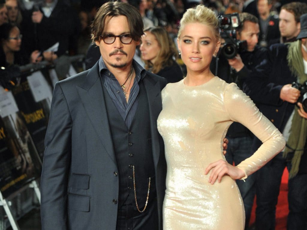 Johnny Depp violent à l’égard d’Amber Heard? Des sms troublants font surface (photos)